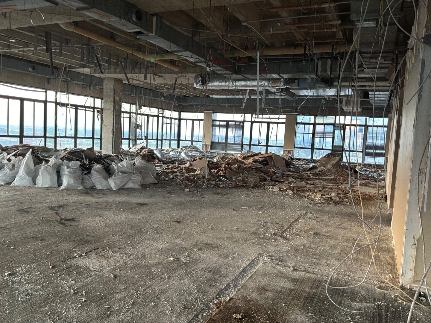 Structural demolition with debris removal